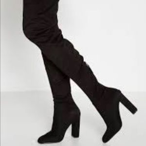 Steve Madden “Rocking” over the knee boots